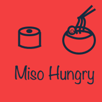 Red background and navy blue writing of Miso Hungry and ramen bowl and sushi roll
